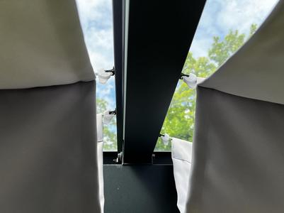 Clip for securing sun shade hook