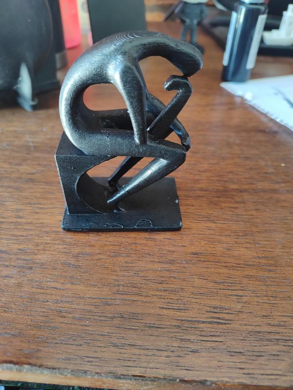 Sculpture of thinking man - art to decorate