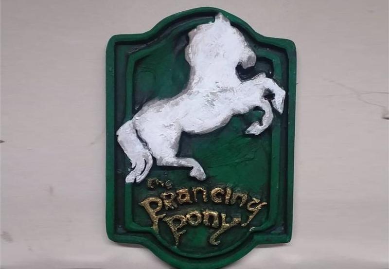 Inn at the Prancing Pony Sign
