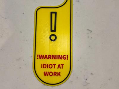 WARNING IDIOT AT WORK    Funny Door Hanger