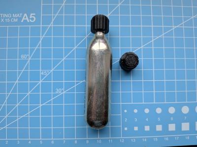 Protective cap for CO2 cartridge