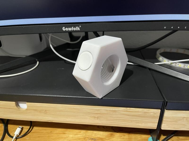 Iwatch charging dock in the shape of a nut