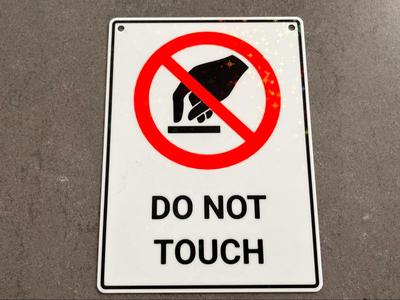 Prohibition sign "Do not touch" in English with AMS