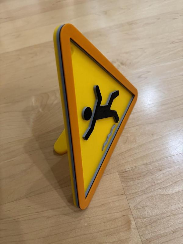 Stand for Caution: Slippery Grounds