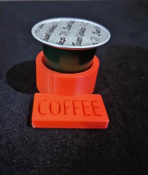 Holder for a small coffee capsule