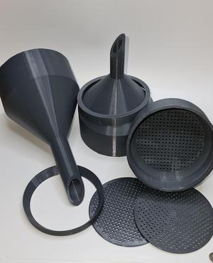 A funnel with a strainer for 90 mm filters