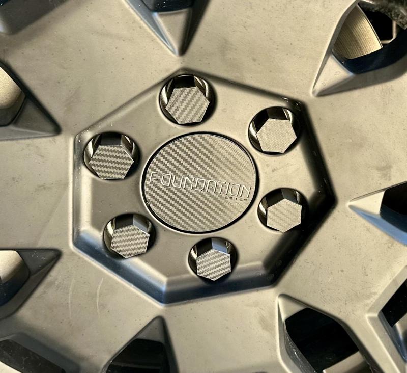 cybertruck wheel center caps with 4 different logos and lug nut covers