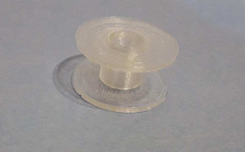 Bobbin for sewing machines.