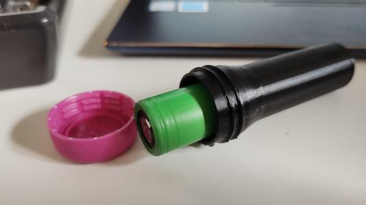 18650 holder with standard PET bottle cap