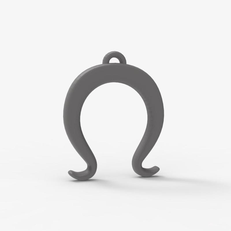 Omega pendant inspired by Alice adness returns