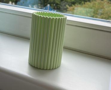 Pen holder in modern groove design