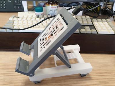 Adjustable phone charging stand
