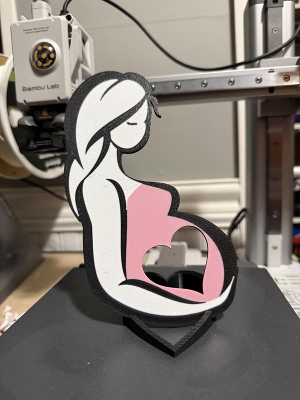 Mother Holding heart shape Ultrasound Frame