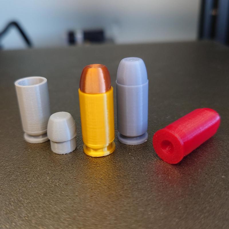 .40 Smith & Wesson replica and snap cap