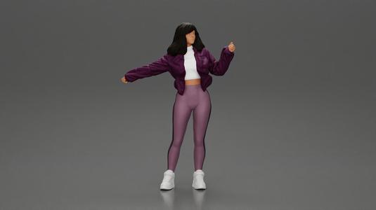 sexy girl in an open jacket and pants, posing happily