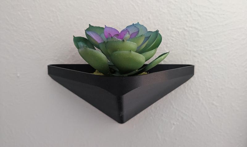 Triangular floating wall planter