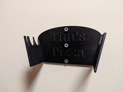 Wall mounted custom pizza peel holder