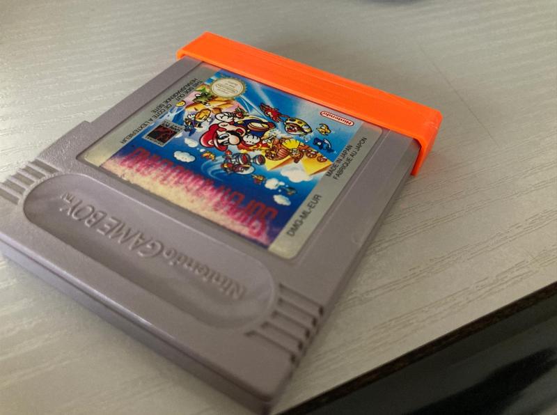 Fast GameBoy cartridge dust cover.