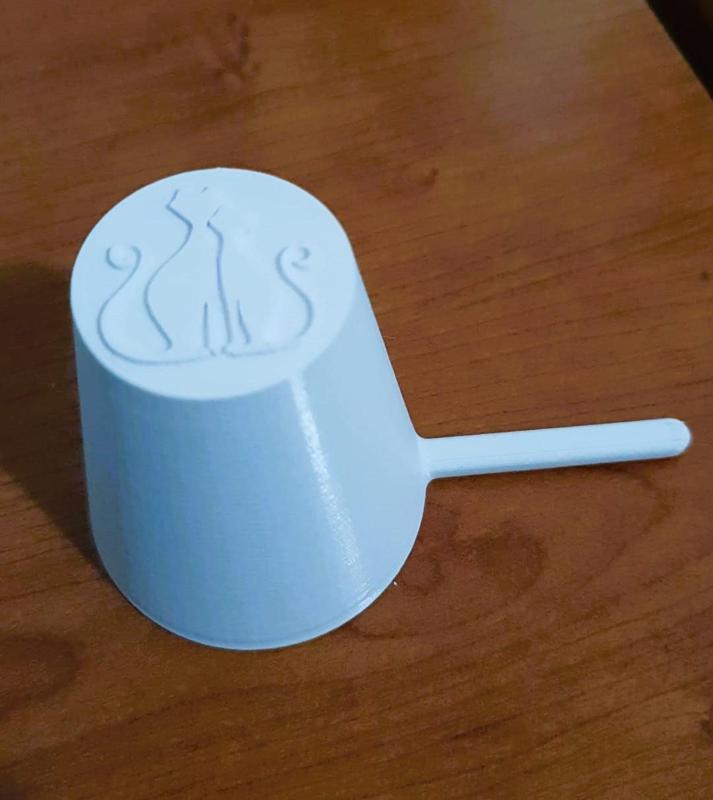 Cat kibble dispenser