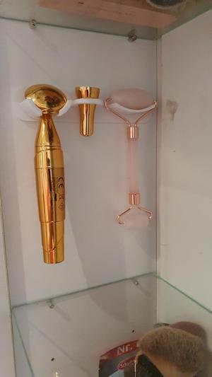 Facial massage tool holder in closet