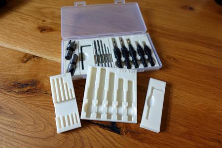 Custom drill bit holders