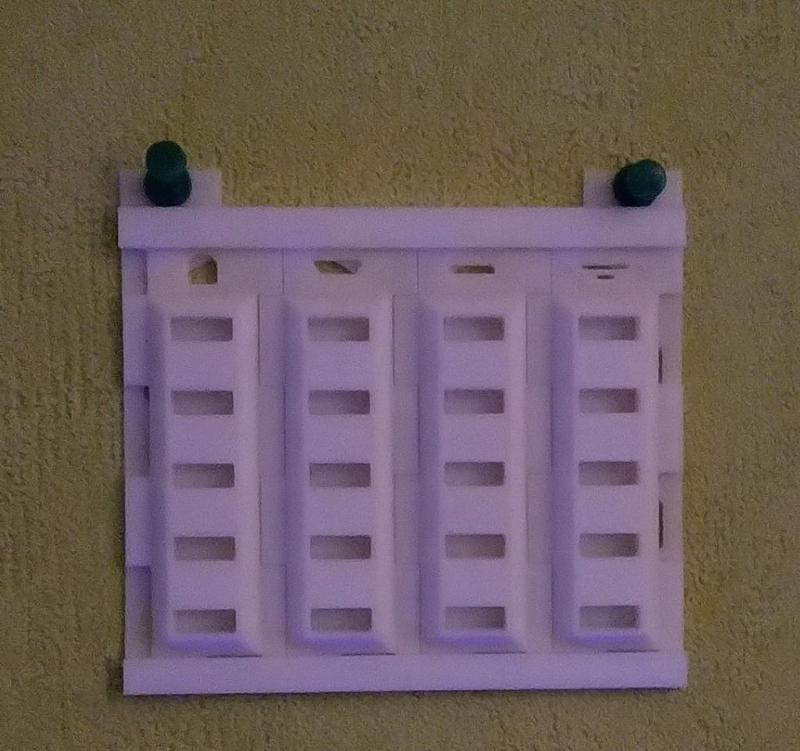 Wall mount for USB cable holder