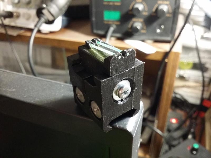 Picattiny rail mounted sport style AR15 rear sight with fiber optic and windage adjust