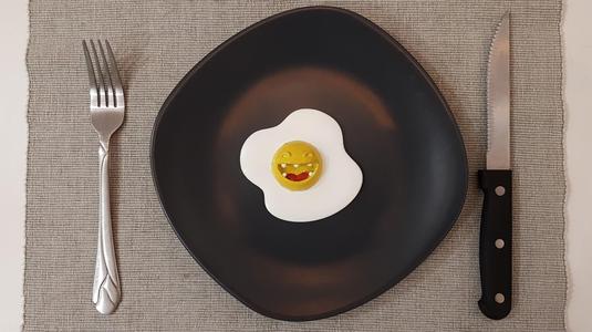Eggmilio  - happy over easy egg