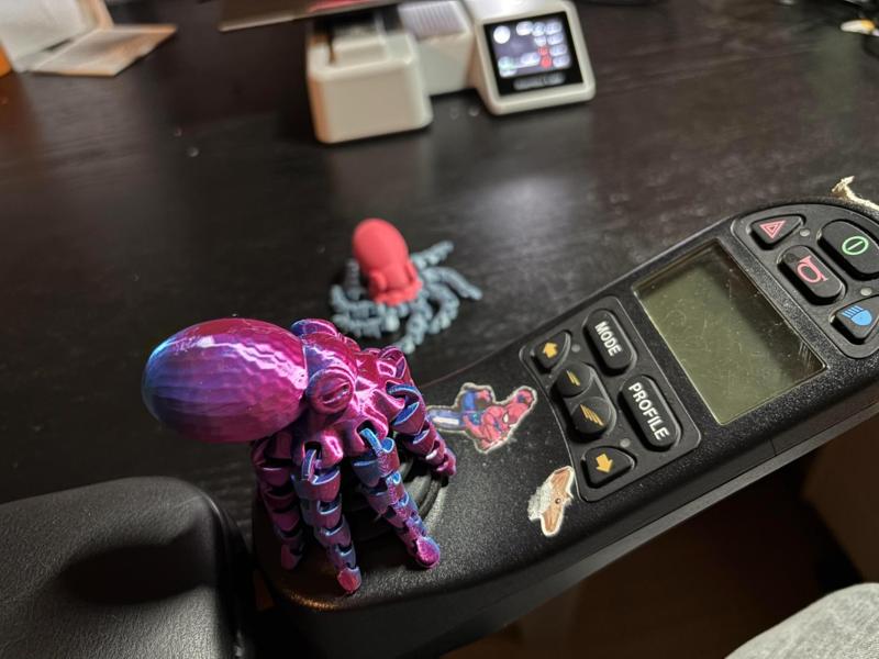 Wheelchair Joystick Octopus with articulated arms