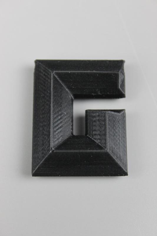 Letter G with borehole