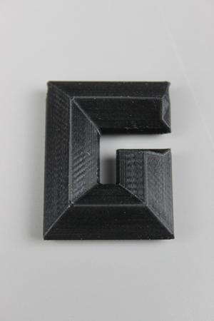 Letter G with borehole