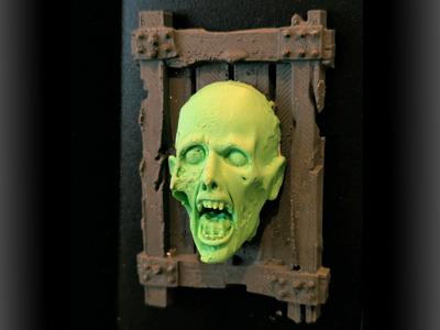 Framed zombie head magnet