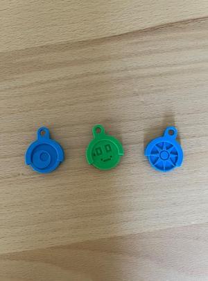 Shopping cart token + holder