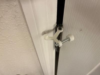 Hinge Mounted Door Stopper