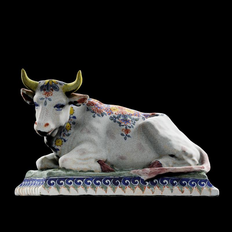 Lying ox with wreath of flowers