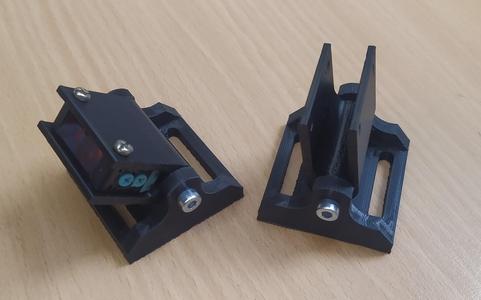 Photoelectric sensor movable holder