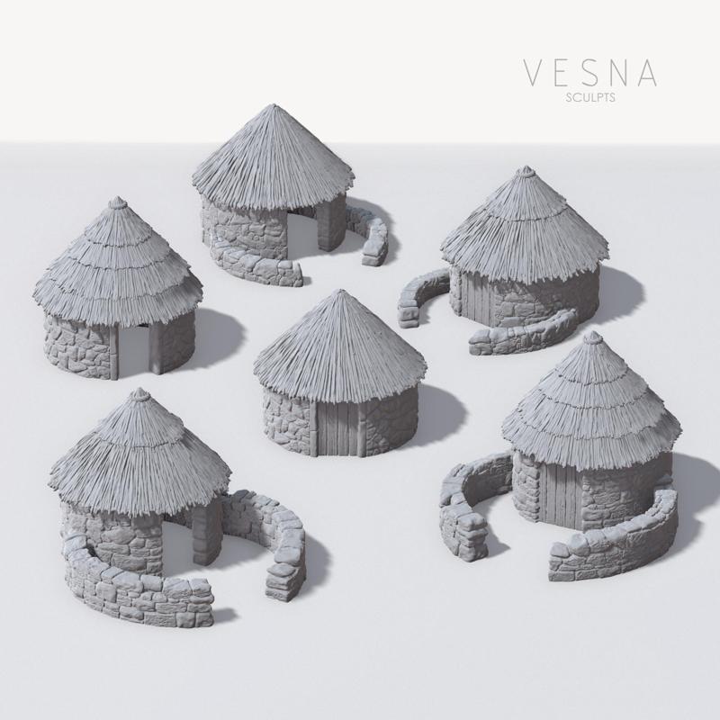 CELTIC STONE HUTS WITH THATCHED ROOFS