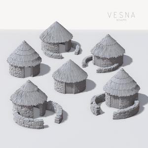 CELTIC STONE HUTS WITH THATCHED ROOFS