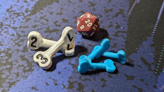 Bone-shaped d4 Die