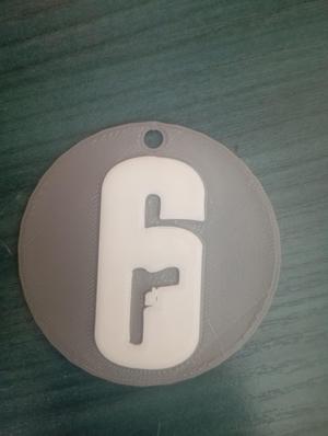 R6 badge/keychain