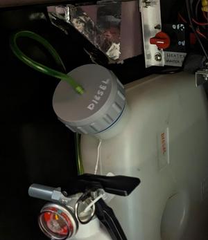 Remote vent for a diesel heater fuel tank cap