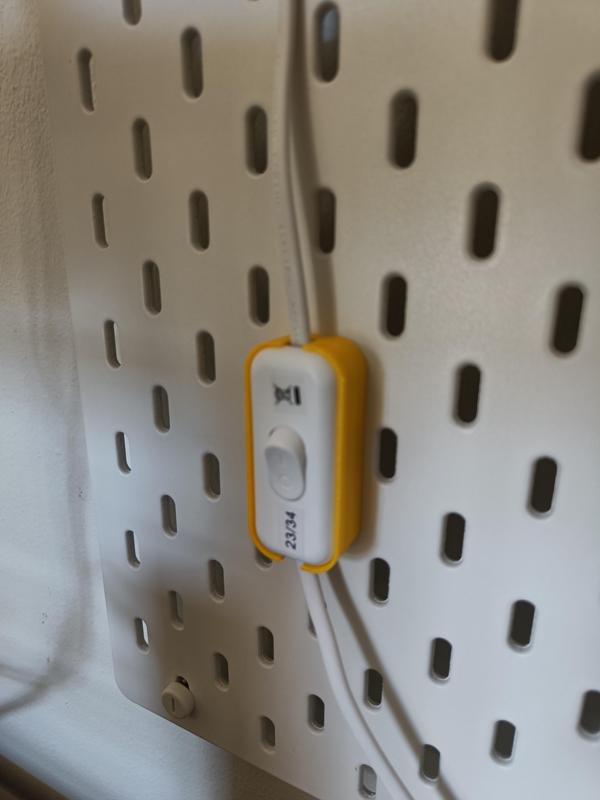 Skadis ledlight switch wall stand