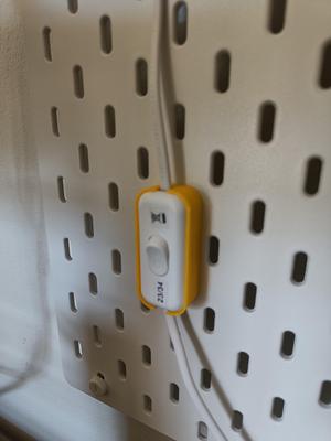 Skadis ledlight switch wall stand