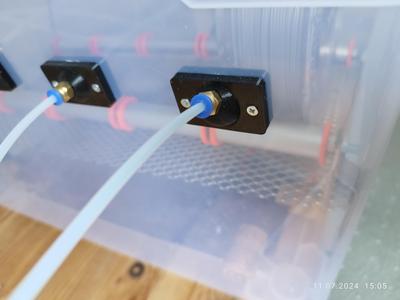 Filament pass through for dry box