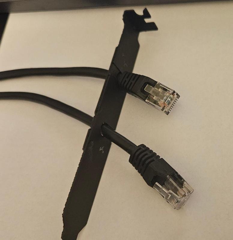 Slot cover with cable passthrough