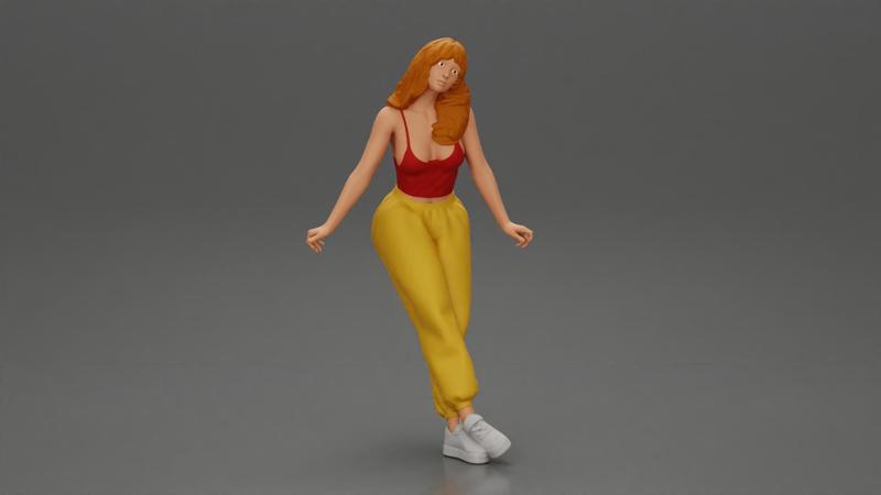 Woman sitting on car in red top yellow pants striking playful pose