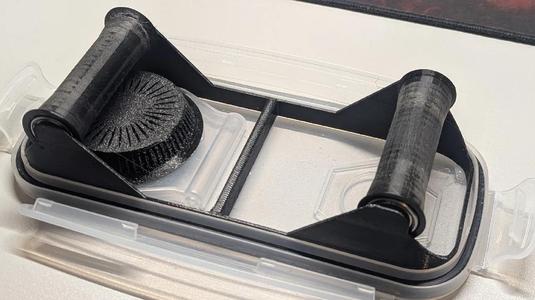 Filament dry box with rollers   