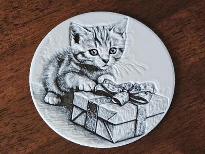 Kitten with a Christmas Gift