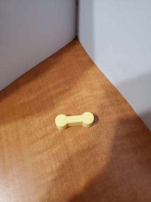 Connector for wooden train tracks.