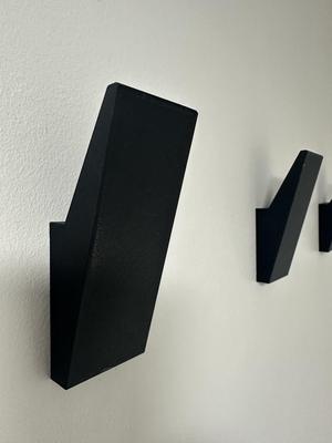 Modern towel wall mount pegs, no visible screws